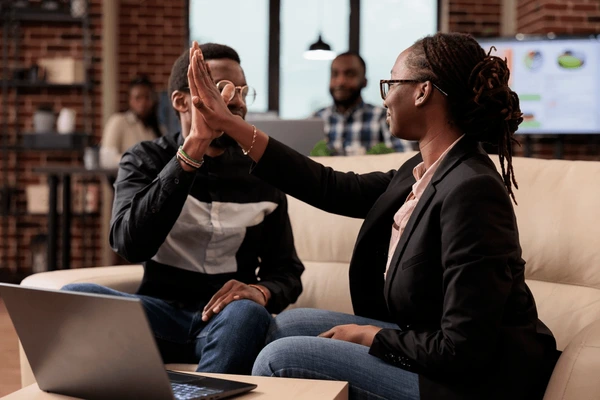 team-colleagues-giving-highfive-office-600nw-2195324153